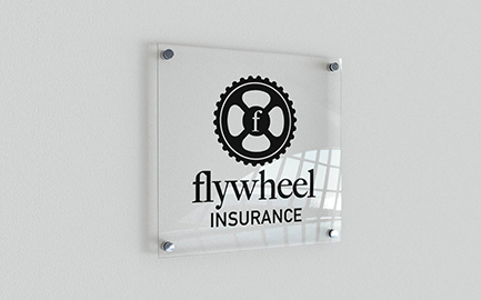 Flywheel Insurance logo printed on a paper